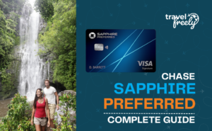A man and woman walking on a path beside a large waterfall. To the right, text reads Travel Freely - Chase Sapphire Preferred Complete Guide next to an image of the Chase Sapphire Preferred Card, inviting you to explore endless possibilities with every step.