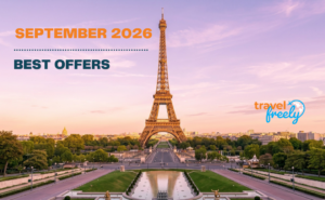 The Eiffel Tower at sunset with September 2026 Best Offers and Travel Freely text overlayed. The sky is pink, the cityscape is visible in the background, and a subtle mention of the best travel credit card inspires your next adventure.